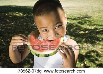 Stock Photo - boy eating watermelon. 
fotosearch - search 
stock photos, 
pictures, images, 
and photo clipart