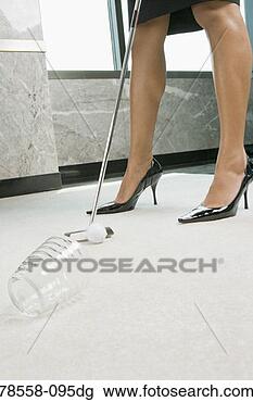 Stock Photo - businesswoman 
golfing in office. 
fotosearch - search 
stock photos, 
pictures, images, 
and photo clipart