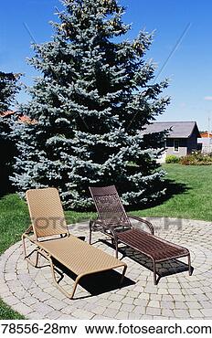 Picture - chairs on patio. 
fotosearch - search 
stock photos, 
pictures, images, 
and photo clipart