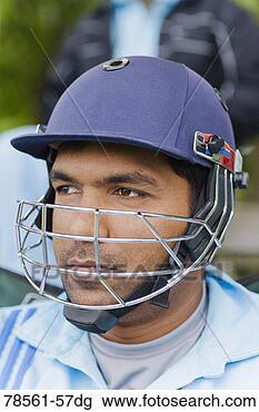 Stock Photo - cricket player 
wearing helmet. 
fotosearch - search 
stock photos, 
pictures, images, 
and photo clipart