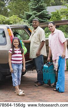 Stock Photo - family packing 
car. fotosearch 
- search stock 
photos, pictures, 
images, and photo 
clipart