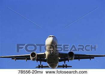 Picture - jet airplane in 
flight. fotosearch 
- search stock 
photos, pictures, 
images, and photo 
clipart