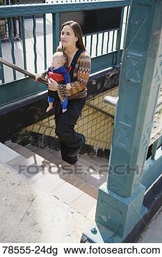 Stock Photo - mother and baby 
on outdoor stairway. 
fotosearch - search 
stock photos, 
pictures, images, 
and photo clipart