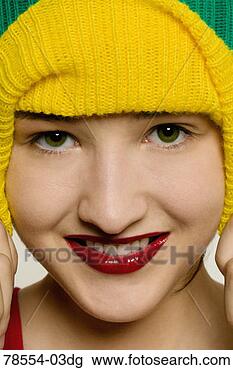 Stock Photo - woman wearing 
stocking cap. 
fotosearch - search 
stock photos, 
pictures, images, 
and photo clipart