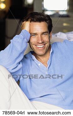 Stock Photo - cheerful man relaxing. 
fotosearch - search 
stock photos, 
pictures, images, 
and photo clipart