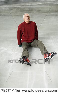 Stock Photo - fallen man on 
ice of ice skating 
rink. fotosearch 
- search stock 
photos, pictures, 
images, and photo 
clipart