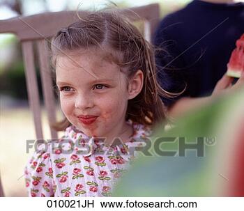 Stock Photo - girl with watermelon 
on her face. fotosearch 
- search stock 
photos, pictures, 
images, and photo 
clipart