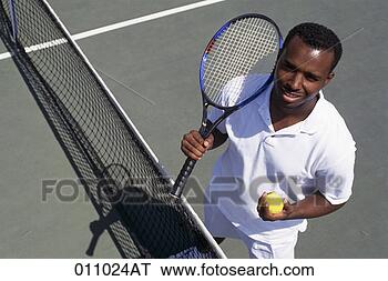 Stock Photo - looking down at 
an african-american 
male in his late 
twenties looking. 
fotosearch - search 
stock photos, 
pictures, images, 
and photo clipart