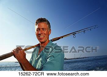 Stock Photo - a middle-aged 
adult caucasian 
male with a fishing 
pole over his. 
fotosearch - search 
stock photos, 
pictures, images, 
and photo clipart