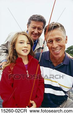 Stock Photo - a close-up of 
three generations 
of a caucasian 
family on a fishing. 
fotosearch - search 
stock photos, 
pictures, images, 
and photo clipart