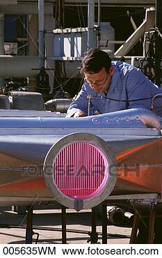 Stock Photo - man in air research 
working on aircraft 
part. fotosearch 
- search stock 
photos, pictures, 
images, and photo 
clipart