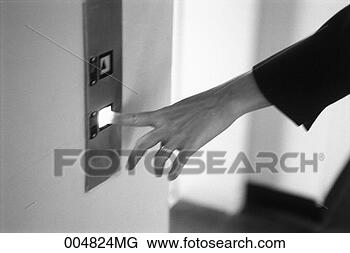 Stock Photo - businesswoman 
pushing elevator 
button,  hand 
only,  blurred, 
 black &. fotosearch 
- search stock 
photos, pictures, 
images, and photo 
clipart