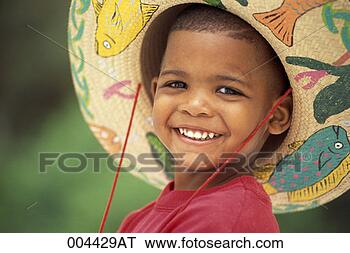 Stock Photo - portrait of boy 
in large straw 
hat. fotosearch 
- search stock 
photos, pictures, 
images, and photo 
clipart