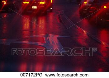 Stock Photo - arrow on wet road. 
fotosearch - search 
stock photos, 
pictures, images, 
and photo clipart