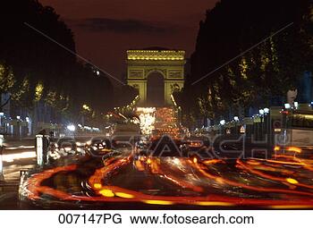 Stock Photo - traffic at arc 
de triomphe at 
night, motion 
blur. fotosearch 
- search stock 
photos, pictures, 
images, and photo 
clipart