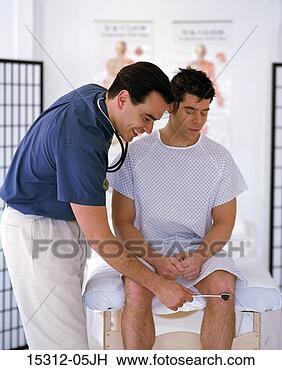 Stock Photo - chiropractor examining 
patient. fotosearch 
- search stock 
photos, pictures, 
images, and photo 
clipart