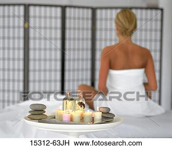 Stock Photo - tray with massage 
stones,  massage 
oils and aromatherapy 
candles and. fotosearch 
- search stock 
photos, pictures, 
images, and photo 
clipart