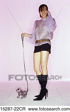 Stock Photo - woman with robotic 
pet on leash. 
fotosearch - search 
stock photos, 
pictures, images, 
and photo clipart