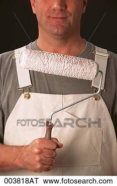 Stock Photo - painter holding 
a paint roller, 
torso only. fotosearch 
- search stock 
photos, pictures, 
images, and photo 
clipart