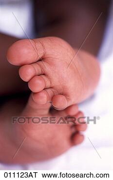 Stock Photo - african-american 
baby's feet, close-up. 
fotosearch - search 
stock photos, 
pictures, images, 
and photo clipart