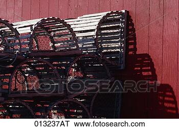 Stock Photo - close-up of lobster 
traps stacked 
up outside, maine. 
fotosearch - search 
stock photos, 
pictures, images, 
and photo clipart
