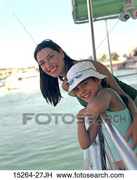Stock Photo - mom and daughter 
on tour boat. 
fotosearch - search 
stock photos, 
pictures, images, 
and photo clipart