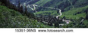 Stock Photo - aerial view of 
winding road through 
the alps, switzerland. 
fotosearch - search 
stock photos, 
pictures, images, 
and photo clipart