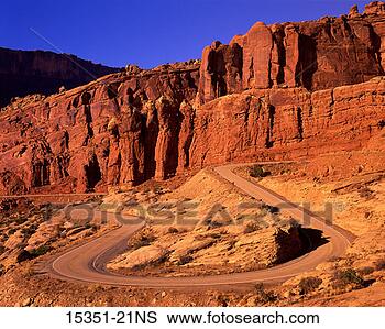 Stock Photo - curving highway 
through arches 
national park, 
utah, usa. fotosearch 
- search stock 
photos, pictures, 
images, and photo 
clipart