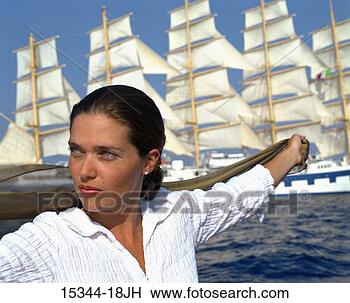 Stock Photo - prime woman with 
extended arms, 
 holding scarf 
in the wind as 
clipper. fotosearch 
- search stock 
photos, pictures, 
images, and photo 
clipart