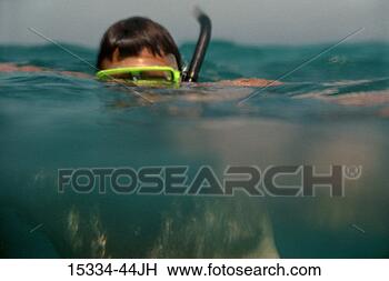 Stock Photo - man snorkeling 
underwater, belize. 
fotosearch - search 
stock photos, 
pictures, images, 
and photo clipart