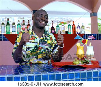 Stock Photo - bartender with 
tropical cocktails, 
giving thumbs 
up sign. fotosearch 
- search stock 
photos, pictures, 
images, and photo 
clipart
