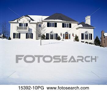 Stock Photo - exterior of colonial 
style house in 
winter. fotosearch 
- search stock 
photos, pictures, 
images, and photo 
clipart