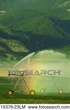 Stock Photo - irrigation in 
farm field, paradise 
valley, montana. 
fotosearch - search 
stock photos, 
pictures, images, 
and photo clipart