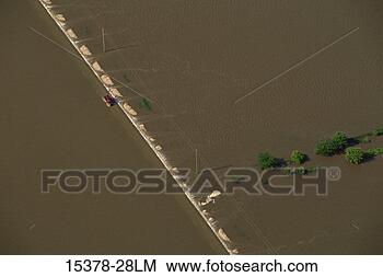 Stock Photo - car traveling 
on roadway flooded 
from the rock 
river, illinois. 
fotosearch - search 
stock photos, 
pictures, images, 
and photo clipart