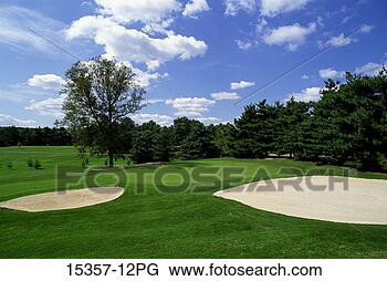 Stock Photo - 8th green of golf 
course with two 
sand traps,  property 
released golf. 
fotosearch - search 
stock photos, 
pictures, images, 
and photo clipart