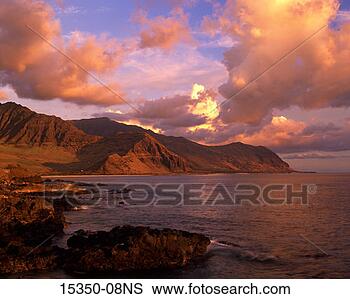 Stock Photo - cliffs along shore 
at sunset, oahu, 
hawaii, usa. fotosearch 
- search stock 
photos, pictures, 
images, and photo 
clipart