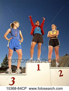 Stock Photo - three female track 
contestants wearing 
winning medals 
around their. 
fotosearch - search 
stock photos, 
pictures, images, 
and photo clipart
