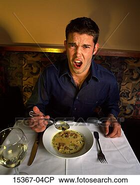 Stock Photo - man seated in 
restaurant, finding 
bug in his soup. 
fotosearch - search 
stock photos, 
pictures, images, 
and photo clipart