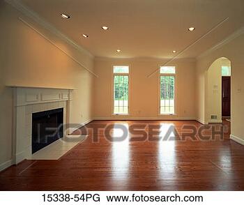 Stock Photo - empty living room 
with fireplace. 
fotosearch - search 
stock photos, 
pictures, images, 
and photo clipart