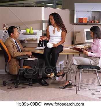 Stock Photo - three co-workers 
having discussion 
in office. fotosearch 
- search stock 
photos, pictures, 
images, and photo 
clipart