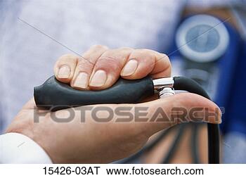 Stock Photo - medical caregiver's 
hand using blood 
pressure pump. 
fotosearch - search 
stock photos, 
pictures, images, 
and photo clipart
