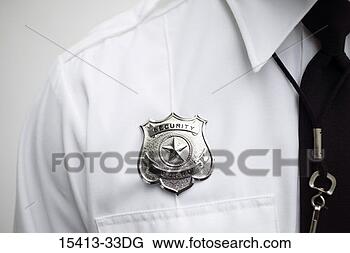 Stock Photo - male security 
guard wearing 
badge. fotosearch 
- search stock 
photos, pictures, 
images, and photo 
clipart
