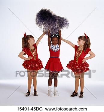 Stock Photo - twin sisters in 
dance costumes 
and young girl 
in cheerleader 
outfit. fotosearch 
- search stock 
photos, pictures, 
images, and photo 
clipart