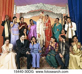 Stock Photo - indian wedding 
party, in front 
of taj mahal backdrop. 
fotosearch - search 
stock photos, 
pictures, images, 
and photo clipart