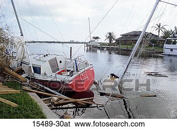 Stock Photo - hurricane storm 
damage; sailboat 
destruction and 
sinking. fotosearch 
- search stock 
photos, pictures, 
images, and photo 
clipart
