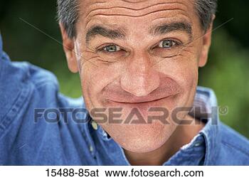 Stock Photo - man making a goofy 
face. fotosearch 
- search stock 
photos, pictures, 
images, and photo 
clipart