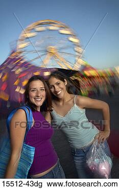 Stock Photo - two girls at the 
amusement park. 
fotosearch - search 
stock photos, 
pictures, images, 
and photo clipart