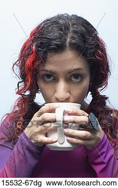 Stock Photo - woman drinking 
coffee. fotosearch 
- search stock 
photos, pictures, 
images, and photo 
clipart