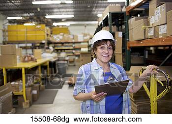 Stock Photo - warehouse employee. 
fotosearch - search 
stock photos, 
pictures, images, 
and photo clipart