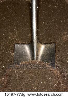 Stock Photo - shovel in dirt. 
fotosearch - search 
stock photos, 
pictures, images, 
and photo clipart